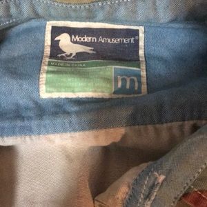 Modern amusement button up shirt in good condition